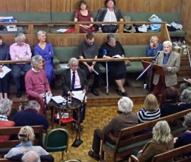 Frank Wood reading to a packed house