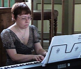 Gail Ford at the piano.
