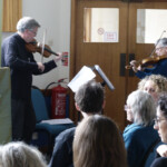 Alistair Bamford and Milly playing before the event began. Alistair Bamford and Milly playing before the event began.