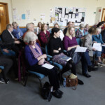 The gathered assembly of poets and guests
